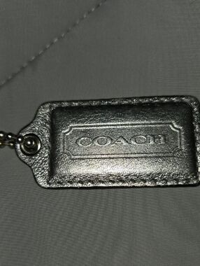 Coach Metallic Silver Leather Logo Tag
